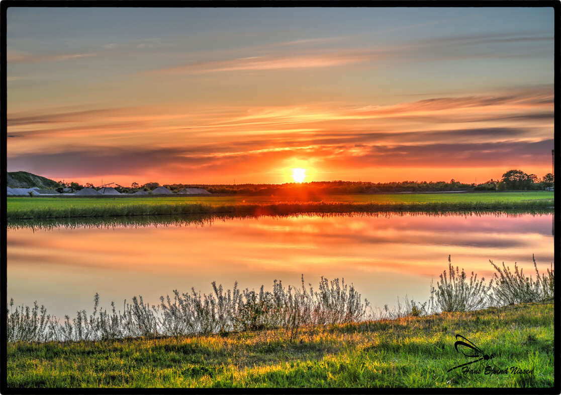 Solnedgang set ved Uge  – Hans Ejvind Nissen